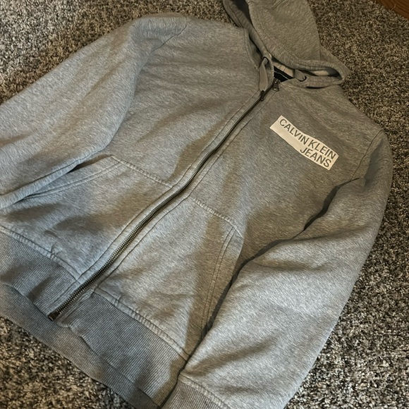 Calvin Klein Jeans Sweaters - Super soft/comfy grey 
Calvin Klein zip up hoodie
Only used once